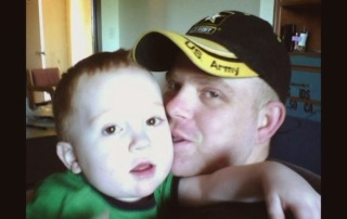 Photo of Kenneth Ellis III and his son.